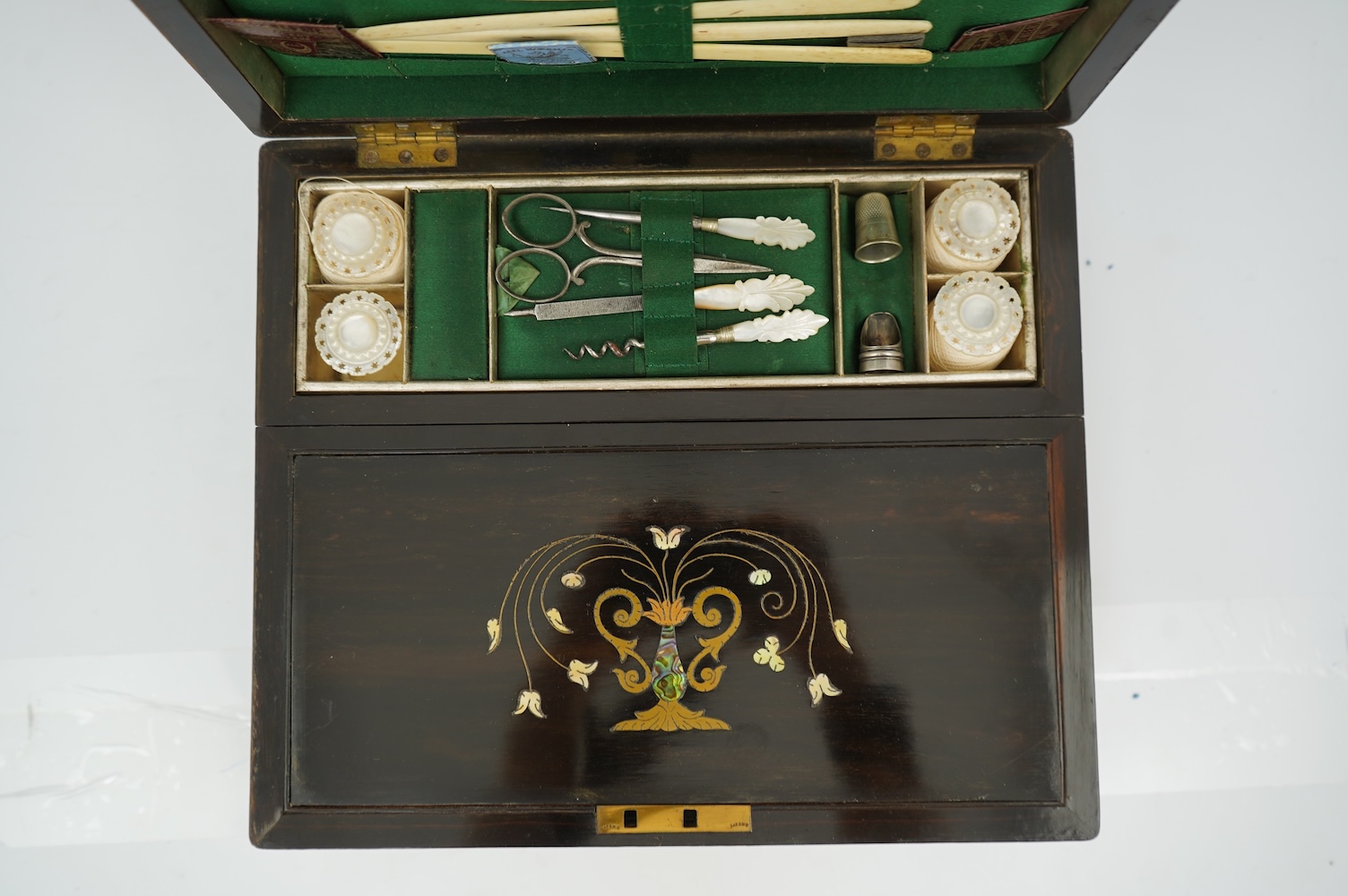 A mid 19th century rosewood writing and sewing box
